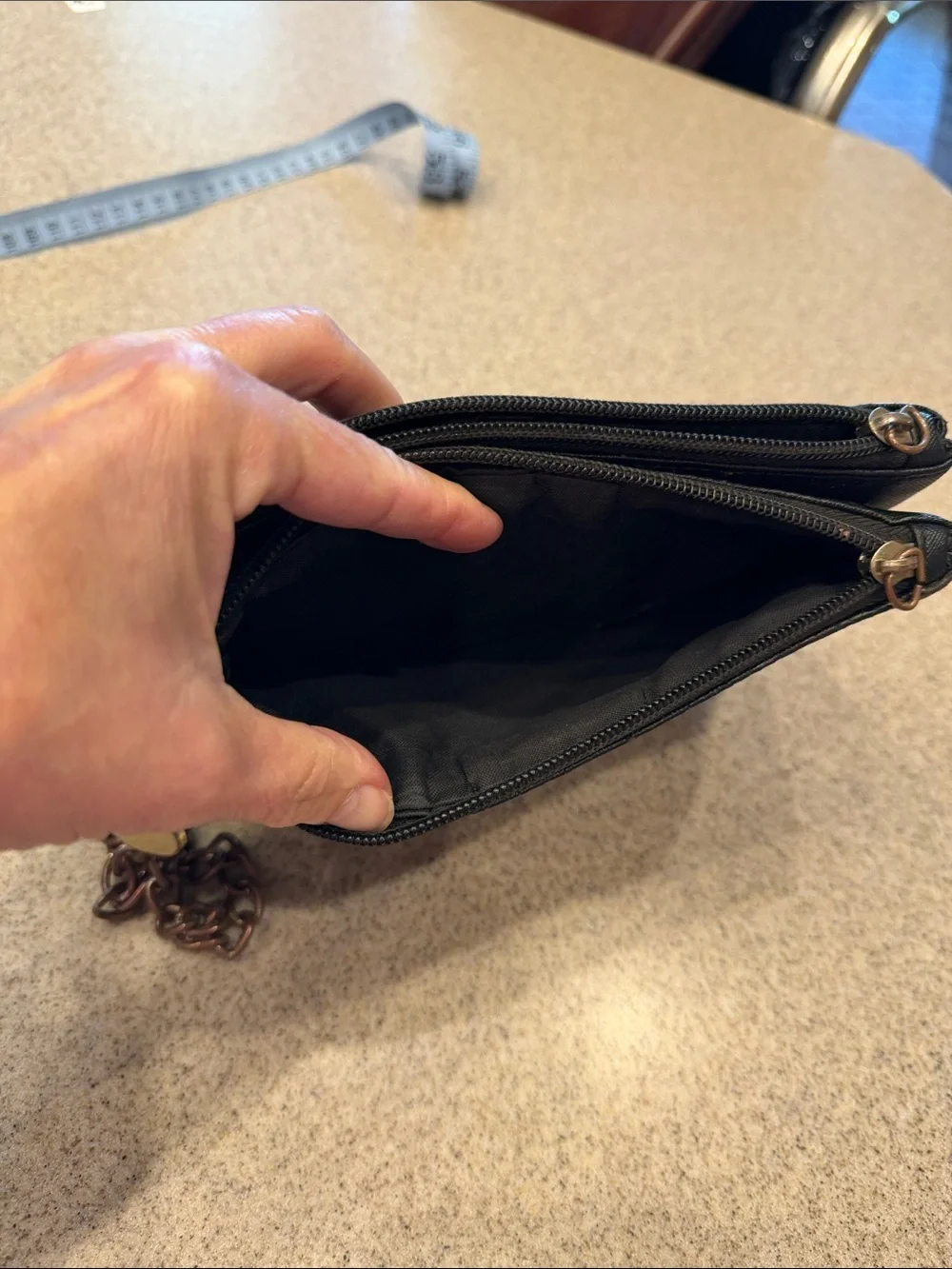 Guess Black Embossed Signature Wristlet with Chain and Heart Charm